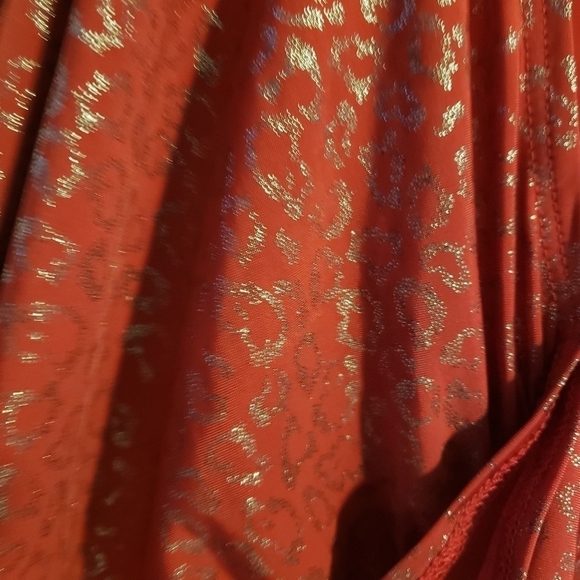 TORRID RED AND SILVER SLEEVELESS TOP WITH RUFFLE FRONT - Picture 3 of 4